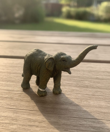 Miniature Realistic Elephant Figurine
