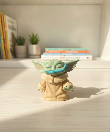 The Child Grogu Figure with Blue Pacifier